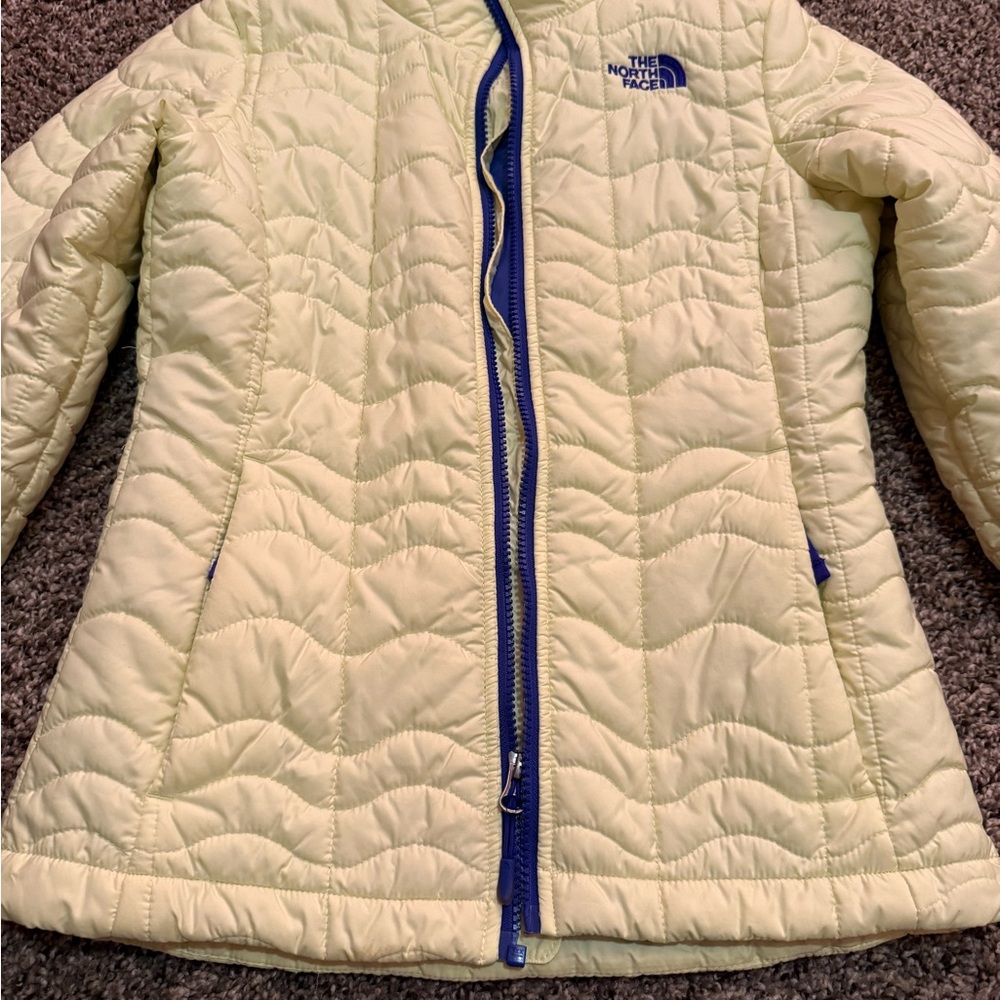 The North Face Light Yellow Quilted Jacket with Blue Accents